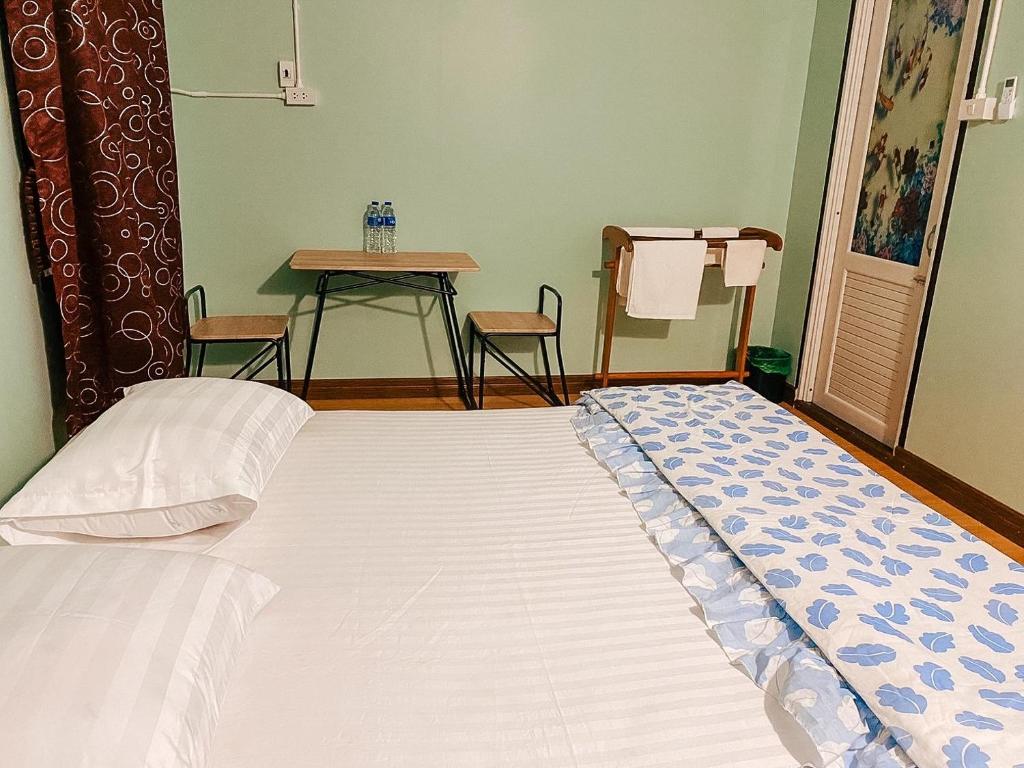 Postel nebo postele na pokoji v ubytování Baan Panmala Guesthouse - Ao Luek, Krabi