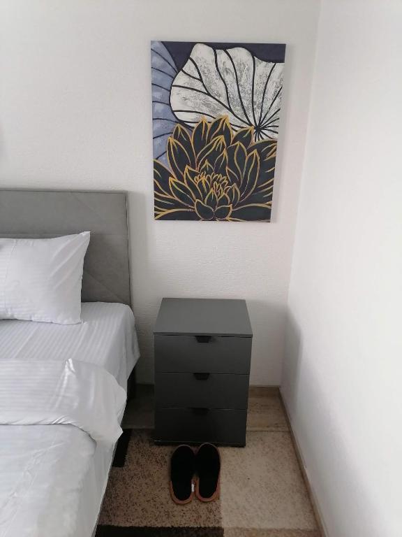 Postel nebo postele na pokoji v ubytování Apartman Ika 9N
