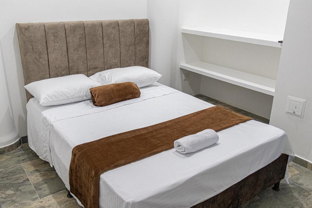 Postel nebo postele na pokoji v ubytování Hotel Maranta
