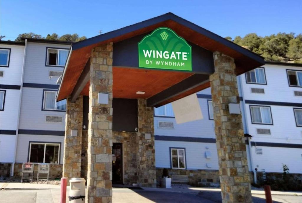 a building with a sign that reads wineries by window at Wingate by Wyndham Eagle Vail Valley in Eagle
