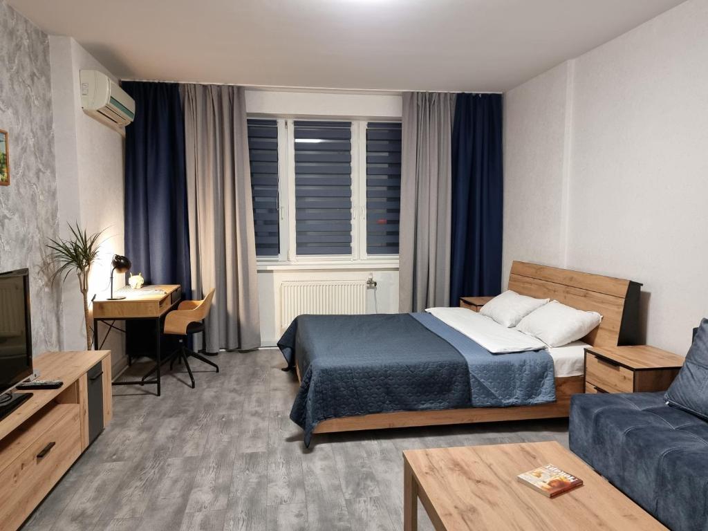 Voodi või voodid majutusasutuse Home Hotel Apartments on Livoberezhna toas