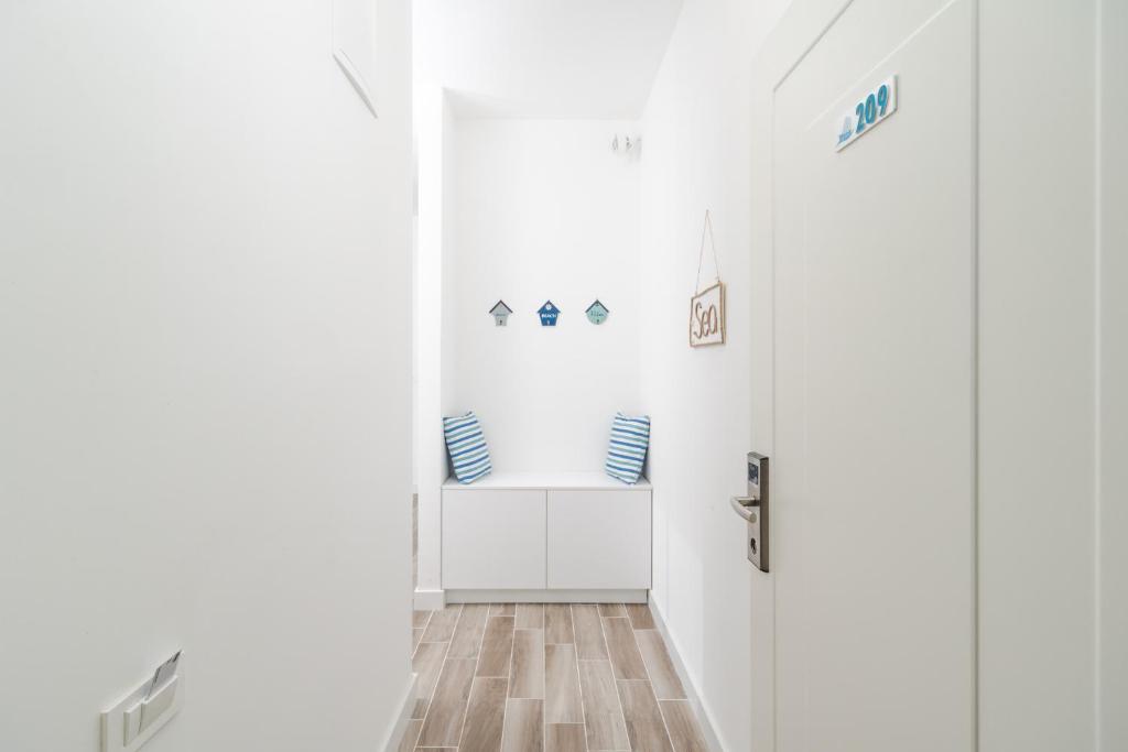 Postel nebo postele na pokoji v ubytování La barca apartments