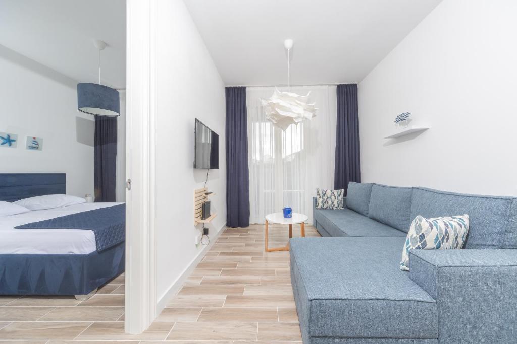 Postel nebo postele na pokoji v ubytování La barca apartments