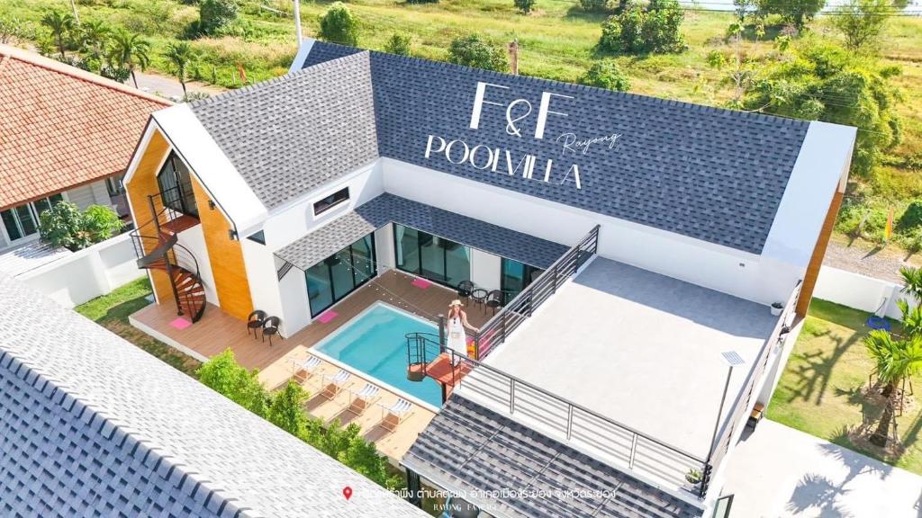 an aerial view of a house with a swimming pool at F&F pool villa Rayong in Rayong