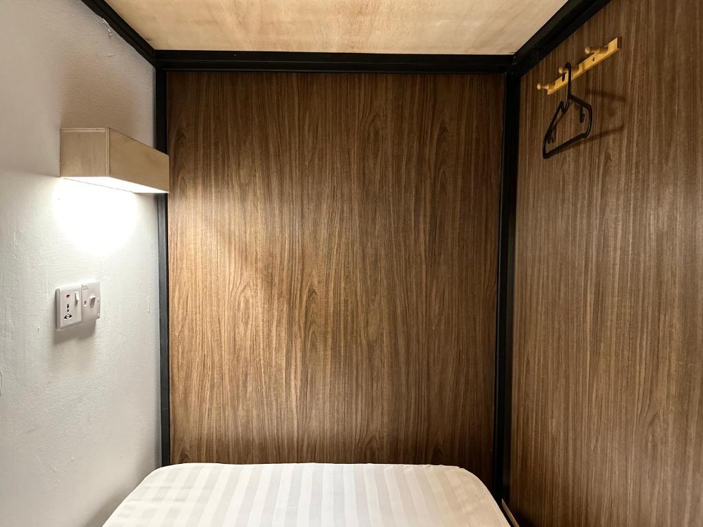Postel nebo postele na pokoji v ubytování Jiran Hostel Kota Kinabalu