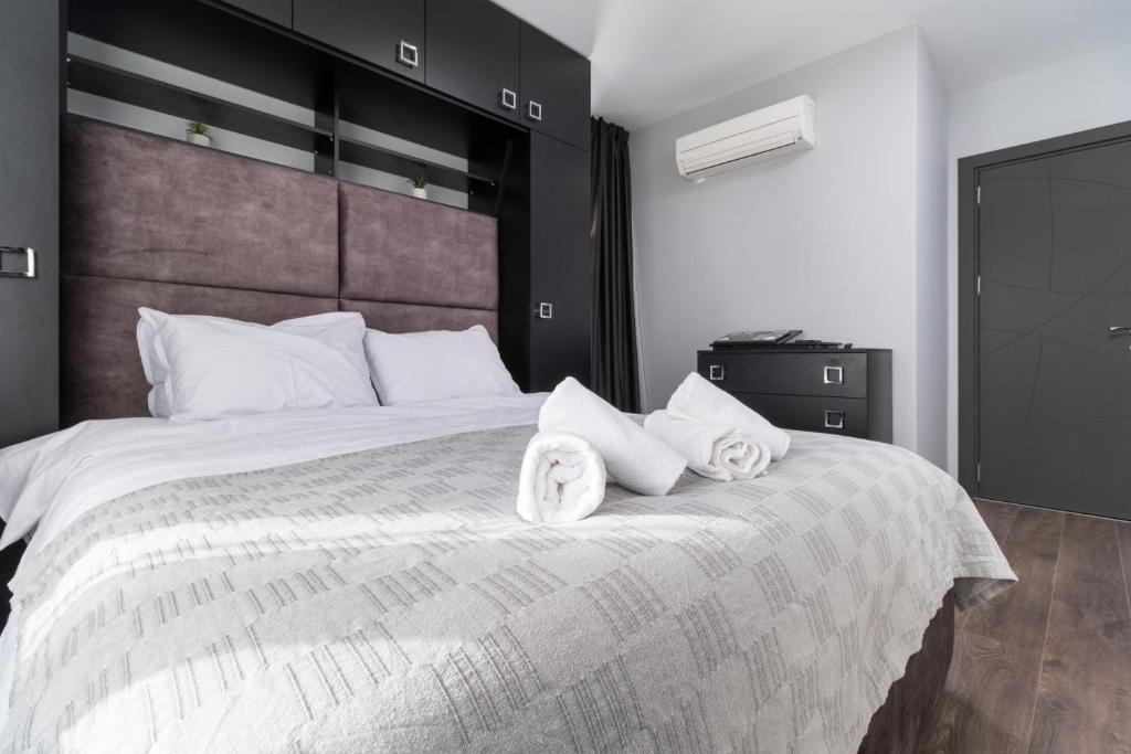 Postel nebo postele na pokoji v ubytování Chic 1BR Apartment with Balcony in Plovdiv