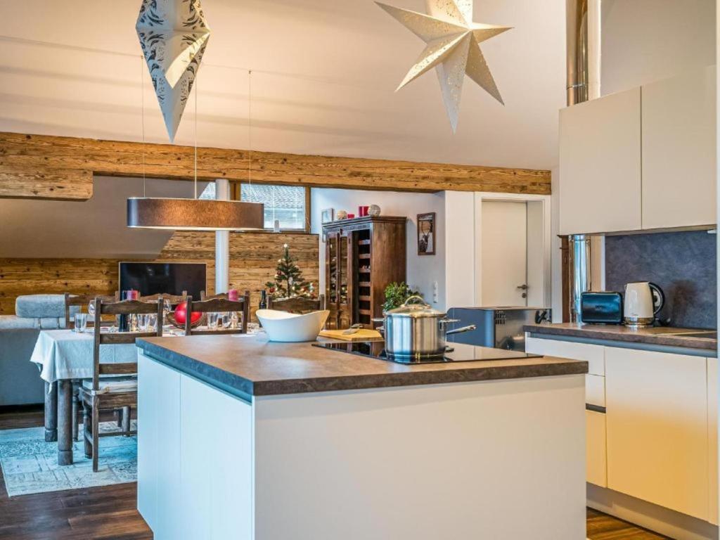 Kuchyň nebo kuchyňský kout v ubytování Penthouse Julia nähe Badesee mit Infrarotsauna -Zell am See Kaprun