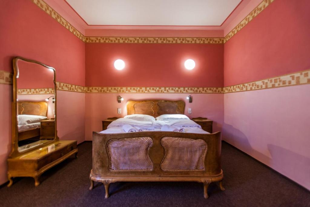 Postel nebo postele na pokoji v ubytování Hotelový dům Adina - Bed and Breakfast