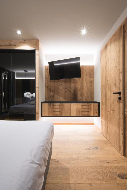 DOLOMITI EXCLUSIVE YOUR MOUNTAIN SUITE - Apartamento Superior Con Sauna