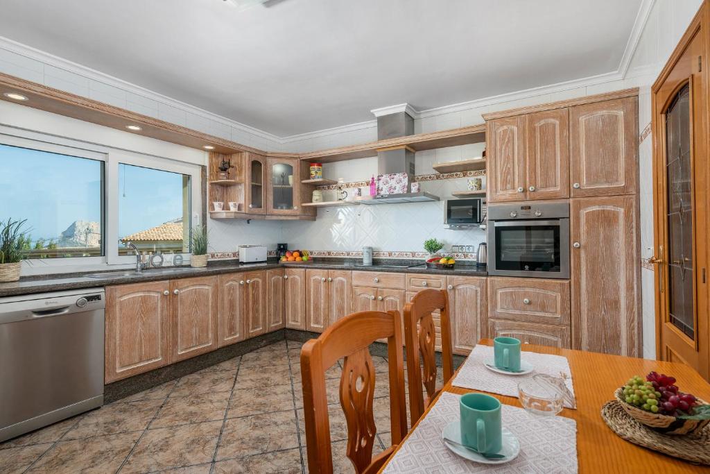 Kuchyňa alebo kuchynka v ubytovaní Villa Fina - PlusHolidays