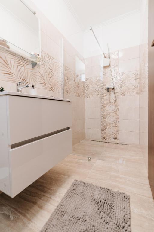 Vannituba majutusasutuses Oliver Apartman