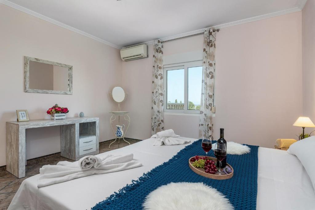 Posteľ alebo postele v izbe v ubytovaní Villa Fina - PlusHolidays