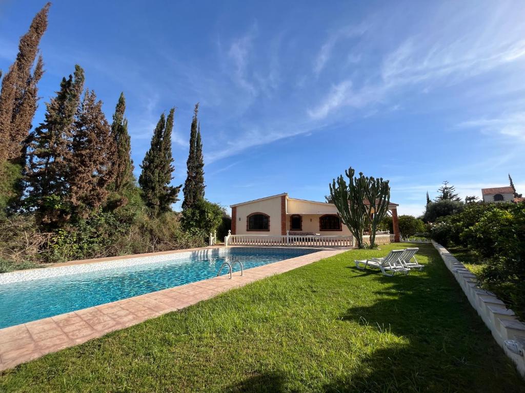 Photo de la galerie de l'établissement Tiguimi Vacances - Oasis Villas, cadre naturel et vue montagne, à Agadir