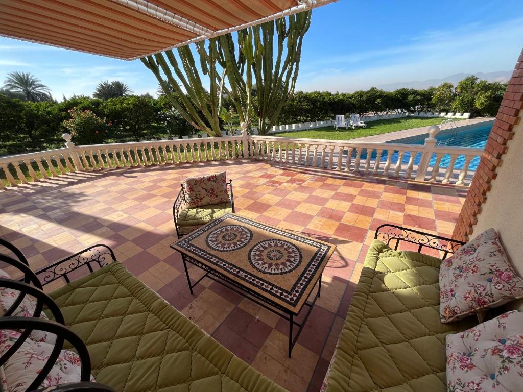 Photo de la galerie de l'établissement Tiguimi Vacances - Oasis Villas, cadre naturel et vue montagne, à Agadir