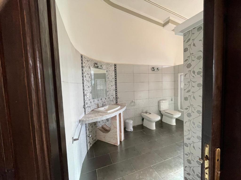 Photo de la galerie de l'établissement Tiguimi Vacances - Oasis Villas, cadre naturel et vue montagne, à Agadir