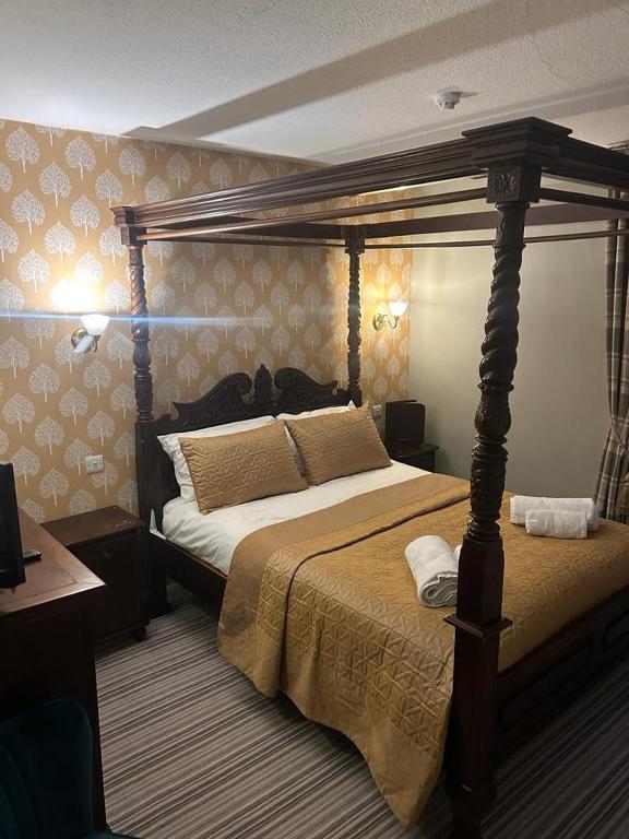 Letto o letti in una camera di The Ardingly Inn