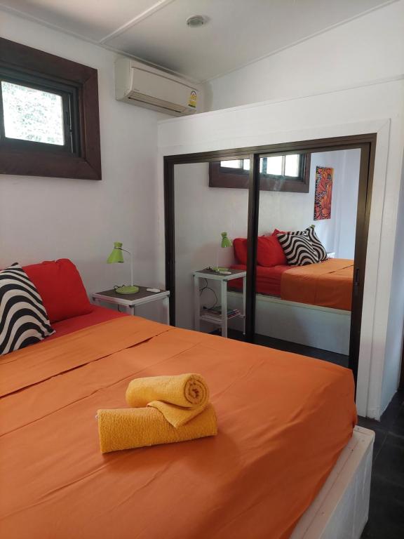 Postel nebo postele na pokoji v ubytování Blessed Koh Chang
