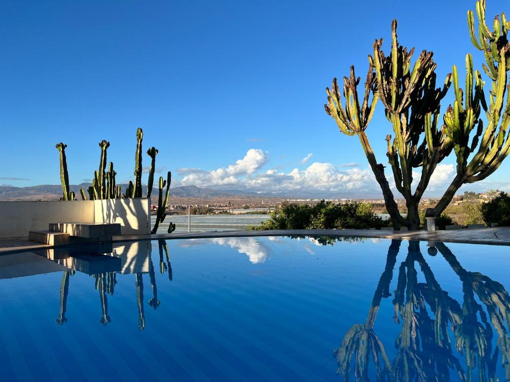 Photo de la galerie de l'établissement Tiguimi Vacances - Oasis Villas, cadre naturel et vue montagne, à Agadir