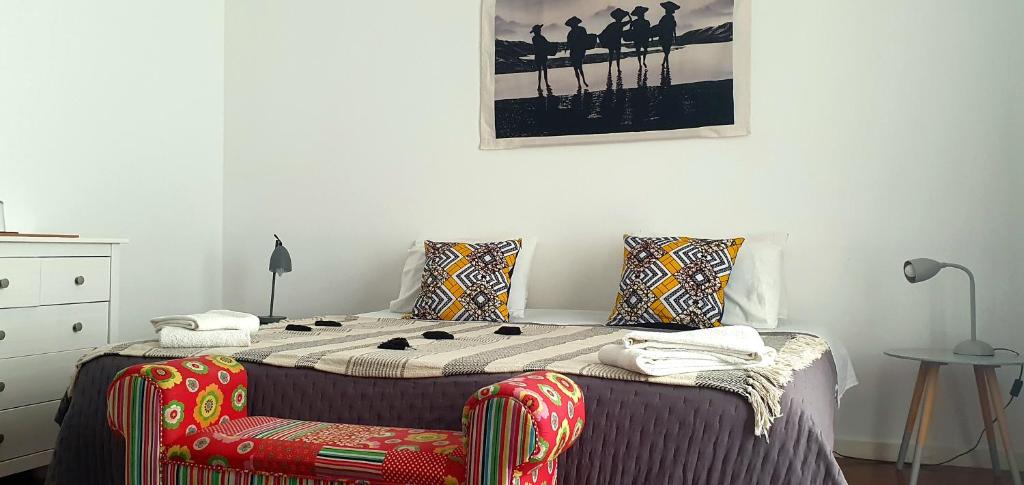 Postel nebo postele na pokoji v ubytování A-Típica GuestHouse