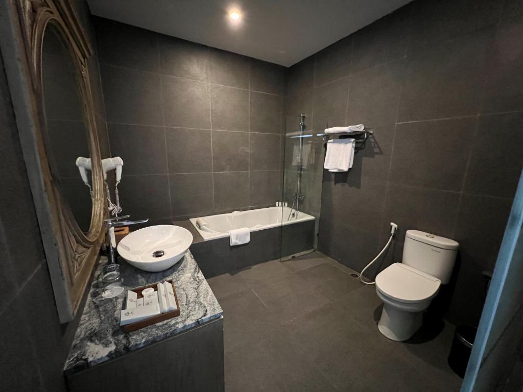 Koupelna v ubytování Tabebuya Resto & Resort