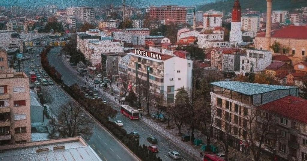 a view of a city with a street and buildings at Hotel Fama in Skopje