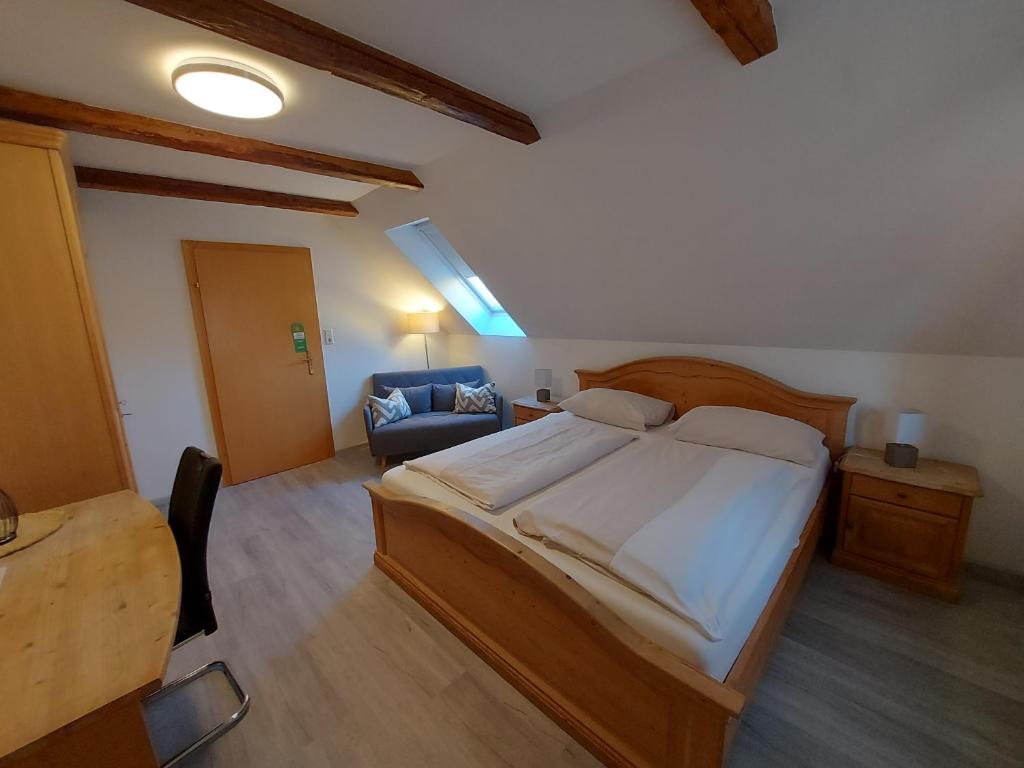 Postel nebo postele na pokoji v ubytování Wollsdorferhof