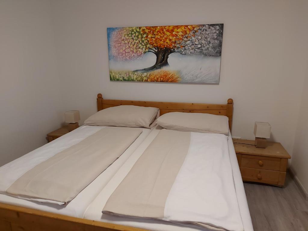 Postel nebo postele na pokoji v ubytování Wollsdorferhof