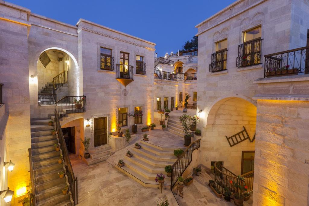 an aerial view of a building with a staircase at Magic Cave House in Ürgüp