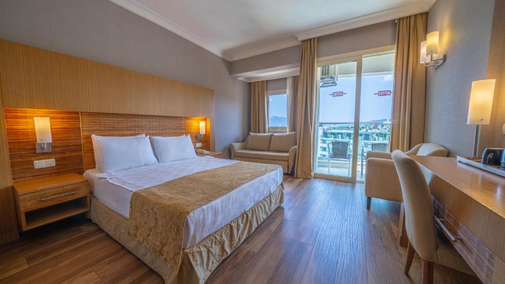 Postel nebo postele na pokoji v ubytování Grand Cettia Hotel
