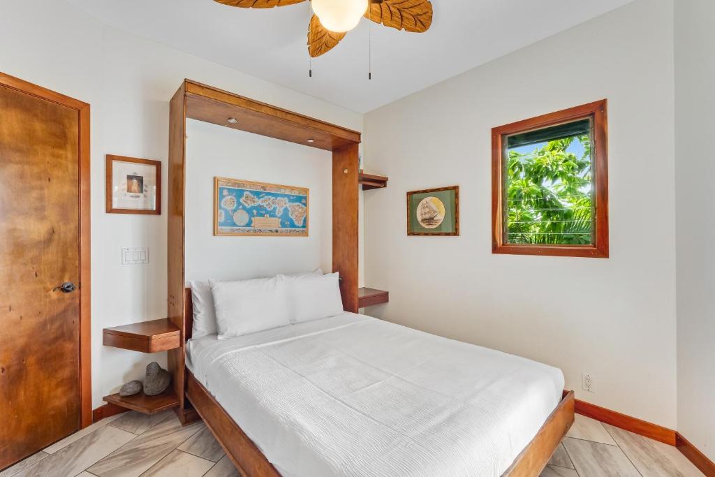 Postel nebo postele na pokoji v ubytování Manini Beachfront Getaway