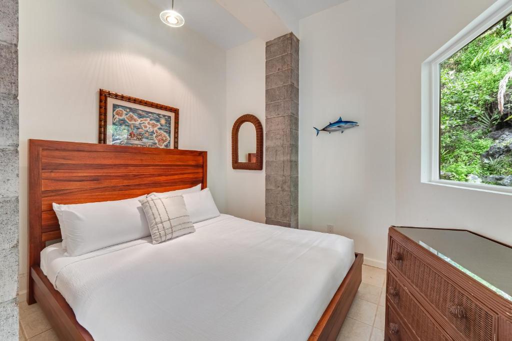 Postel nebo postele na pokoji v ubytování Manini Beachfront Getaway