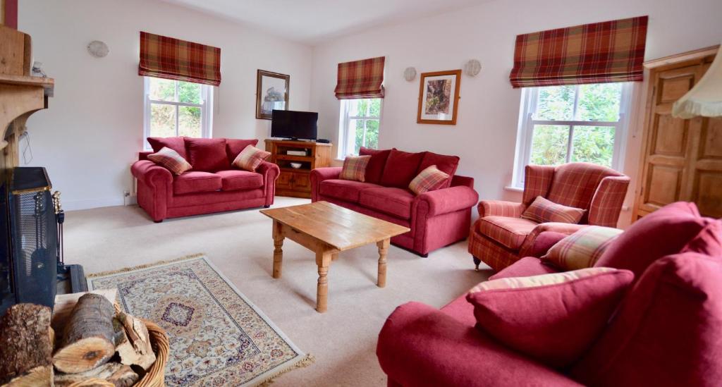 Prostor za sedenje u objektu Delphi Lodge Cottages