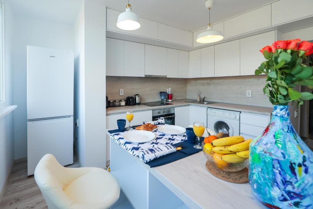 Kuchyň nebo kuchyňský kout v ubytování City Park Apartment