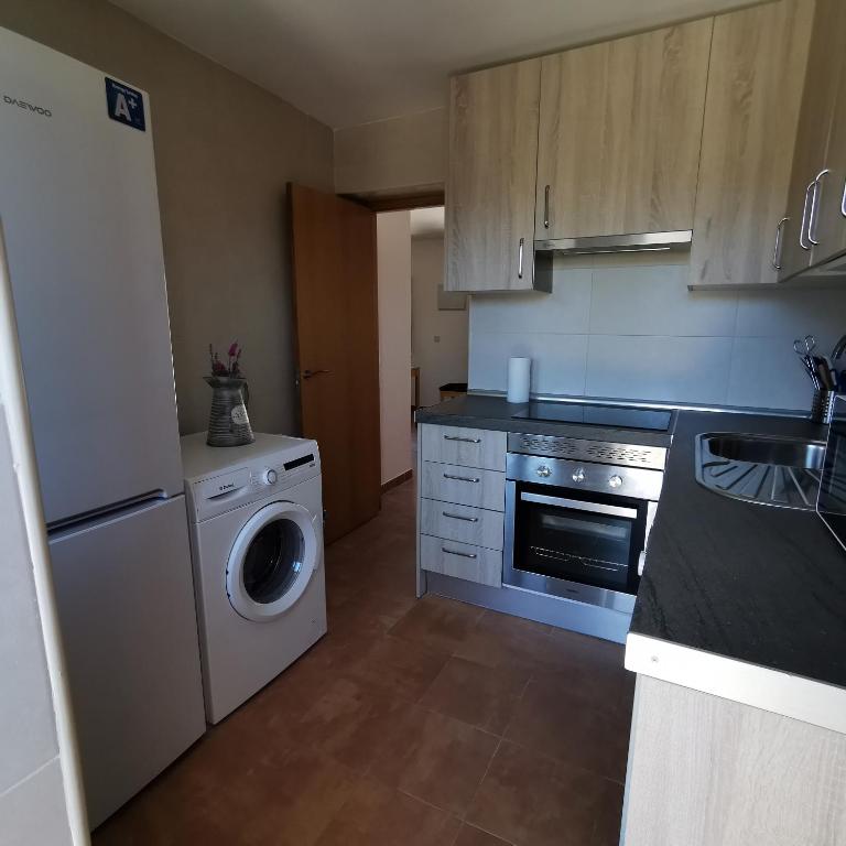Kuchyň nebo kuchyňský kout v ubytování CASITAS PINILLA DEL VALLE