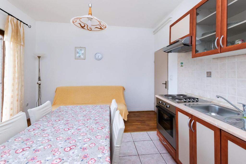 Kuchyň nebo kuchyňský kout v ubytování Apartments Ljubica J