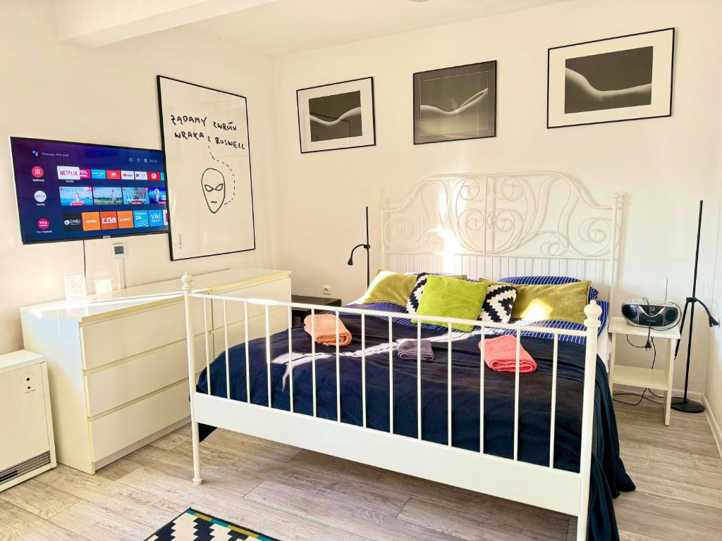 Voodi või voodid majutusasutuse Apartament Dotyk - Monte Cassino- Kameralne Poddasze toas