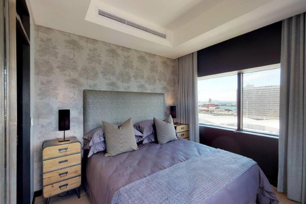 Postelja oz. postelje v sobi nastanitve Luxury City Living - 2 Bedroom Apartment