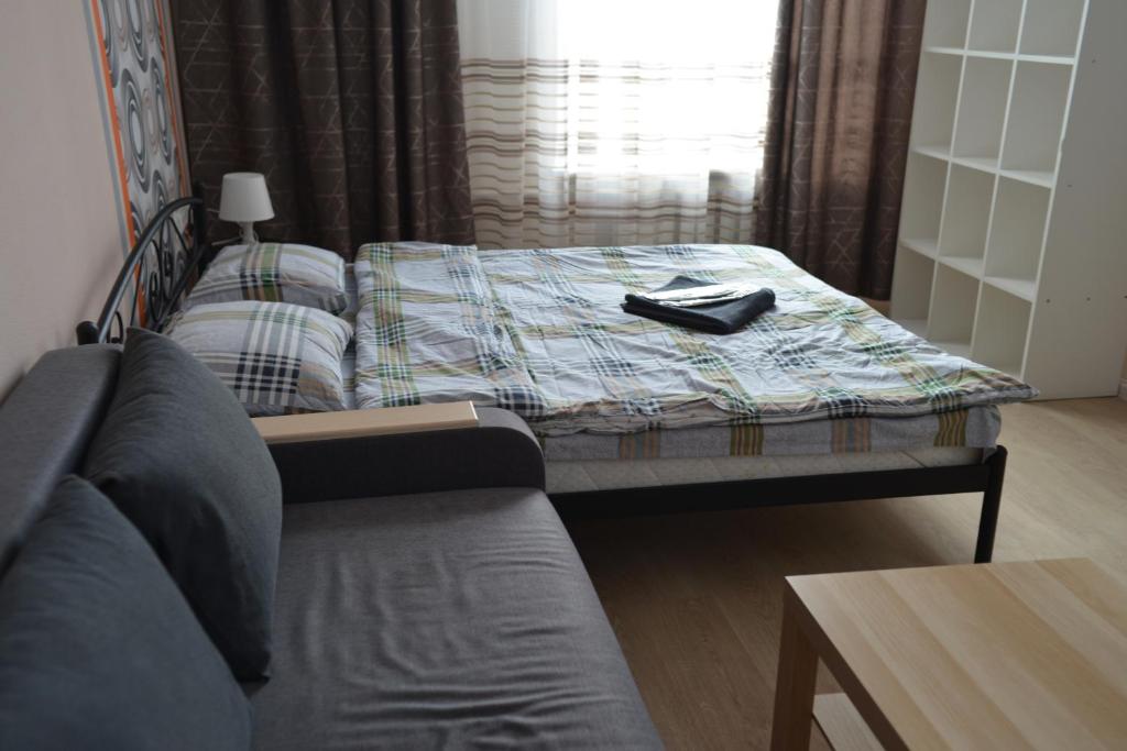 Postel nebo postele na pokoji v ubytování Uneed Rooms - Cloud 9