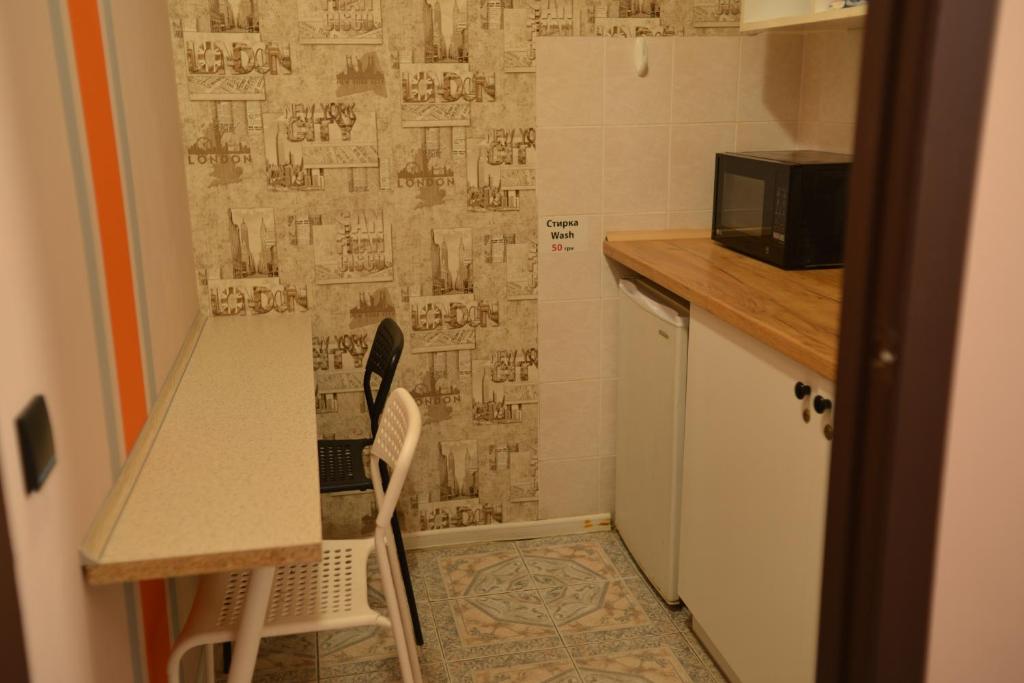Kuchyň nebo kuchyňský kout v ubytování Uneed Rooms - Cloud 9