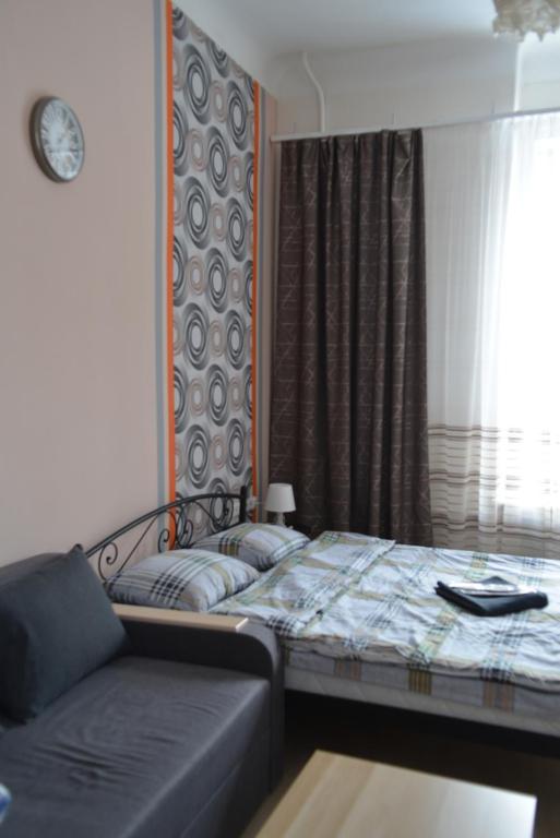 Postel nebo postele na pokoji v ubytování Uneed Rooms - Cloud 9