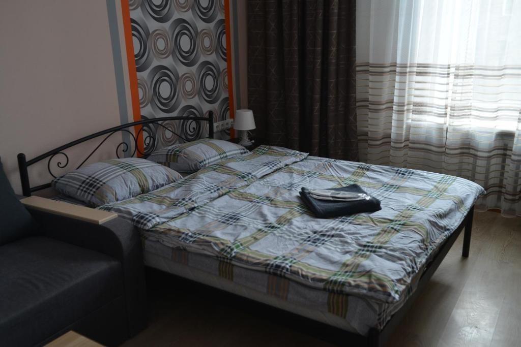 Postel nebo postele na pokoji v ubytování Uneed Rooms - Cloud 9