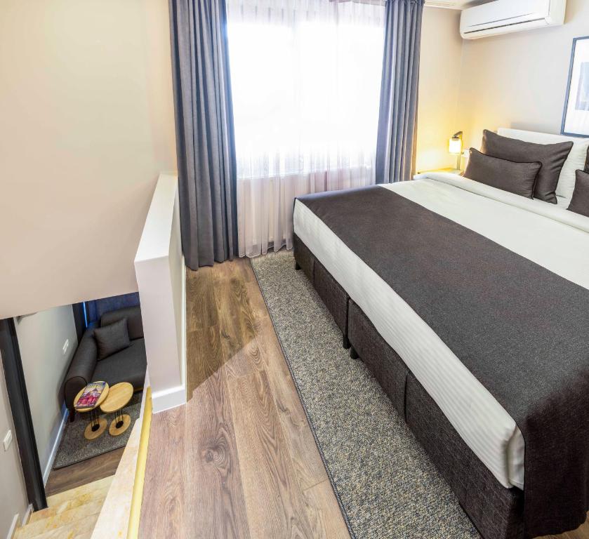 Postel nebo postele na pokoji v ubytování APARTMENTS BAKRAC 26