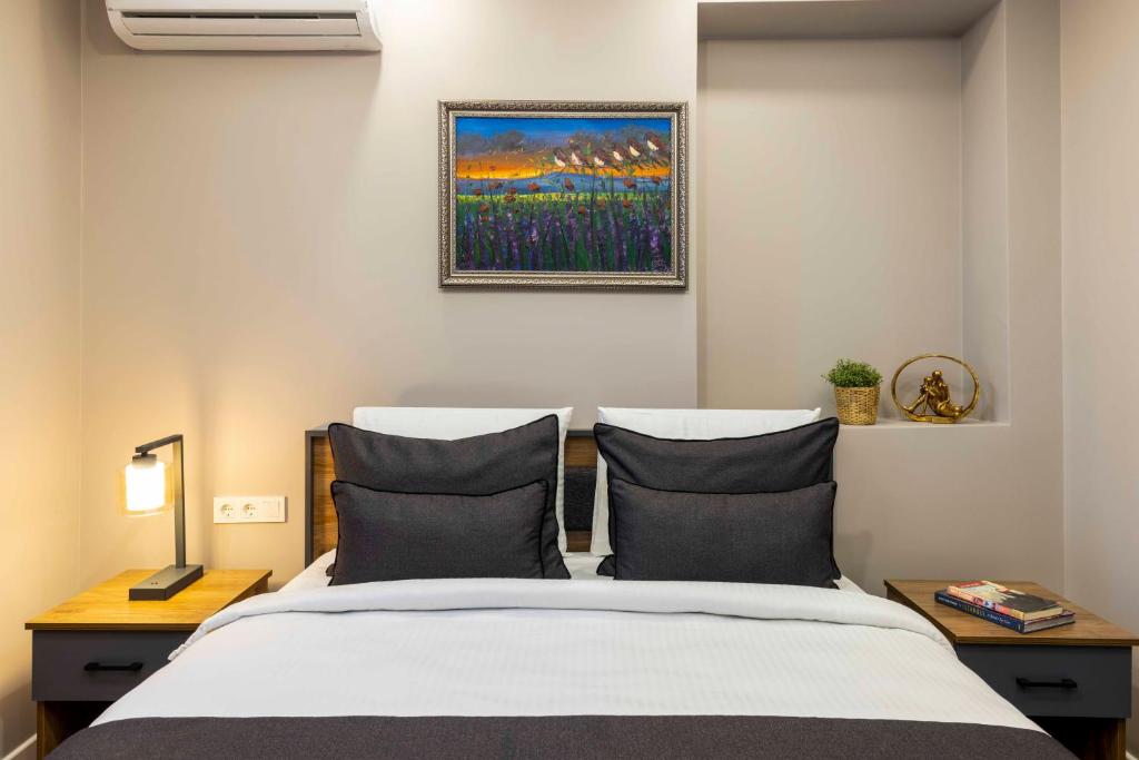 Giường trong phòng chung tại APARTMENTS BAKRAC 26