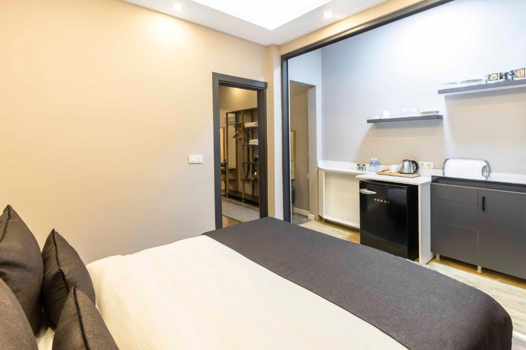 Postel nebo postele na pokoji v ubytování APARTMENTS BAKRAC 26