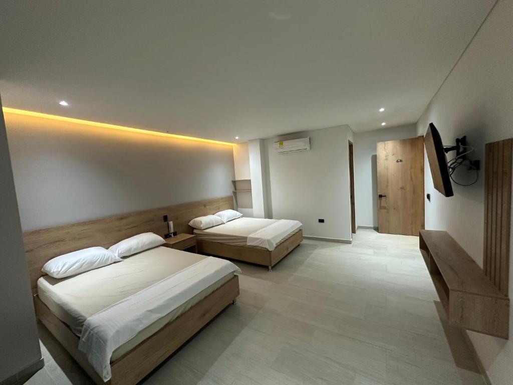 Postel nebo postele na pokoji v ubytování Hotel La Casona San Sebastian