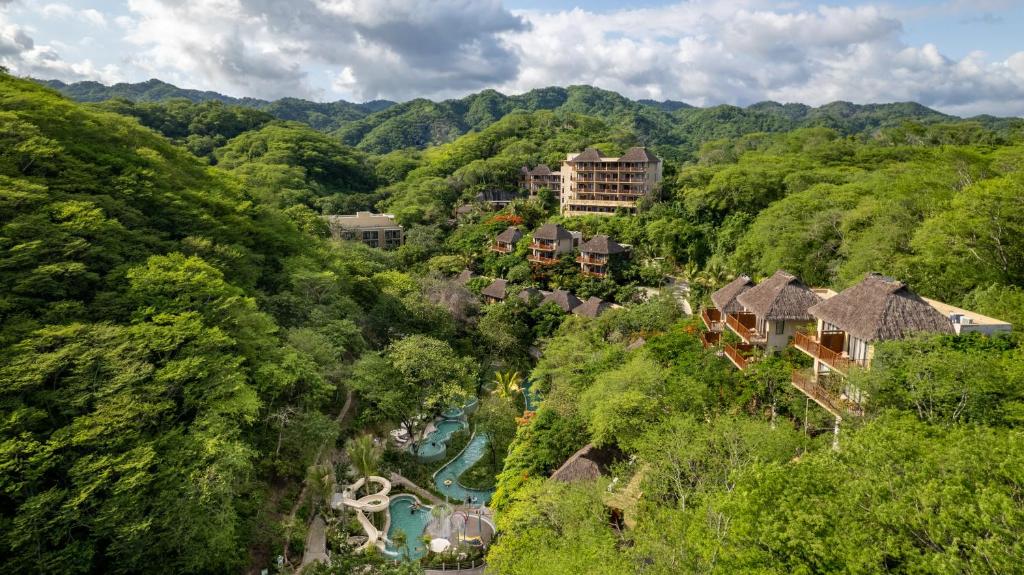an aerial view of a resort in the forest at Delta Hotels by Marriott Riviera Nayarit, an All-Inclusive Resort in Cruz de Huanacaxtle