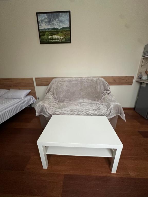 Postel nebo postele na pokoji v ubytování Modern Apartments Uzhgorod