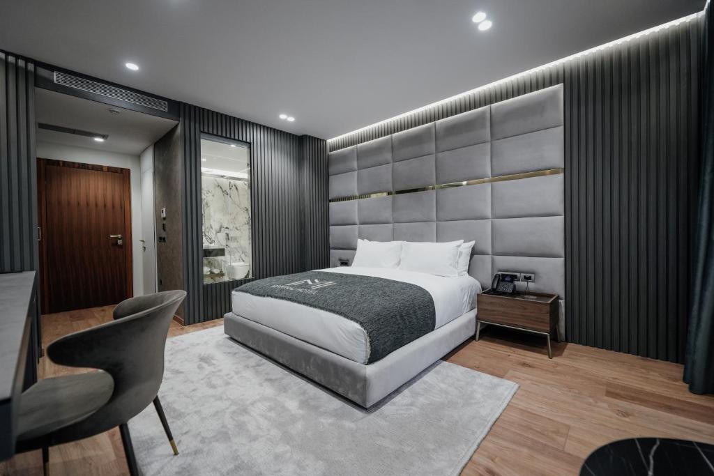 Postel nebo postele na pokoji v ubytování Marinaj Hotel & SPA