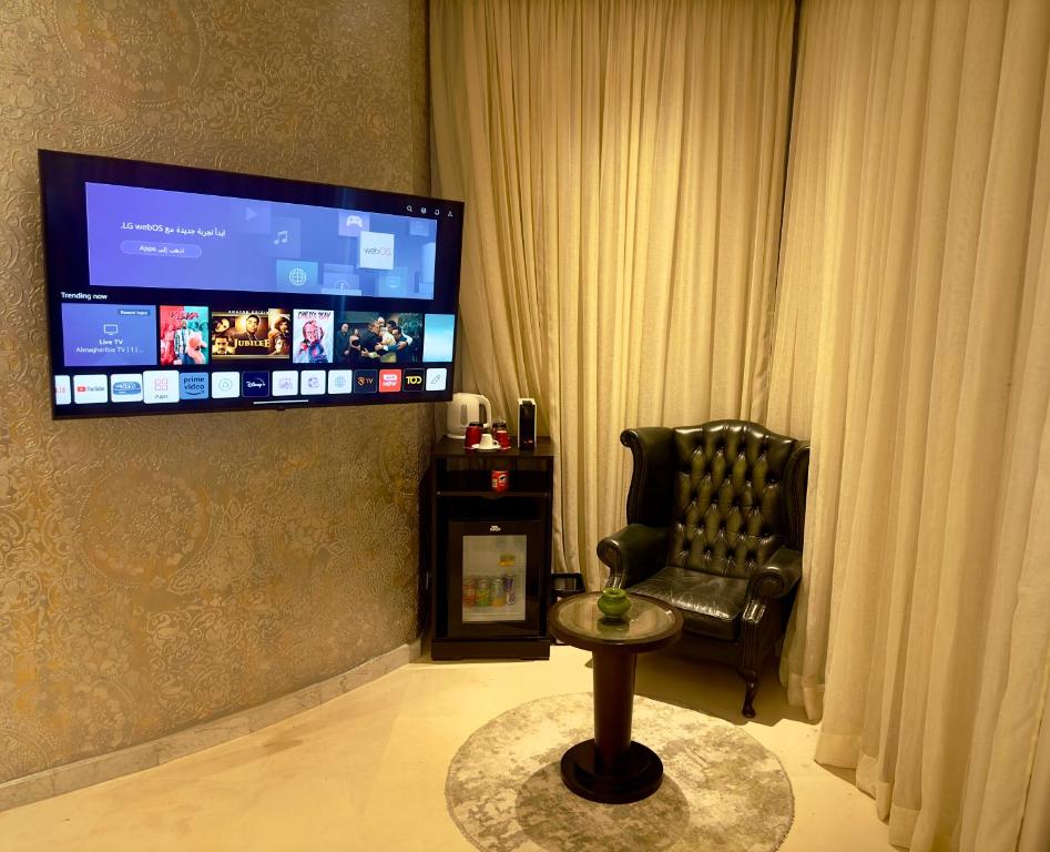 TV a/nebo společenská místnost v ubytování Sillage Palace Sky & Spa