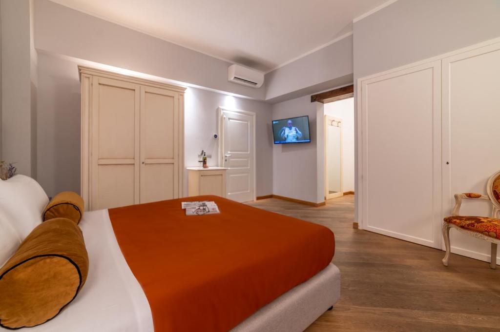 Postel nebo postele na pokoji v ubytování Albergo Falterona